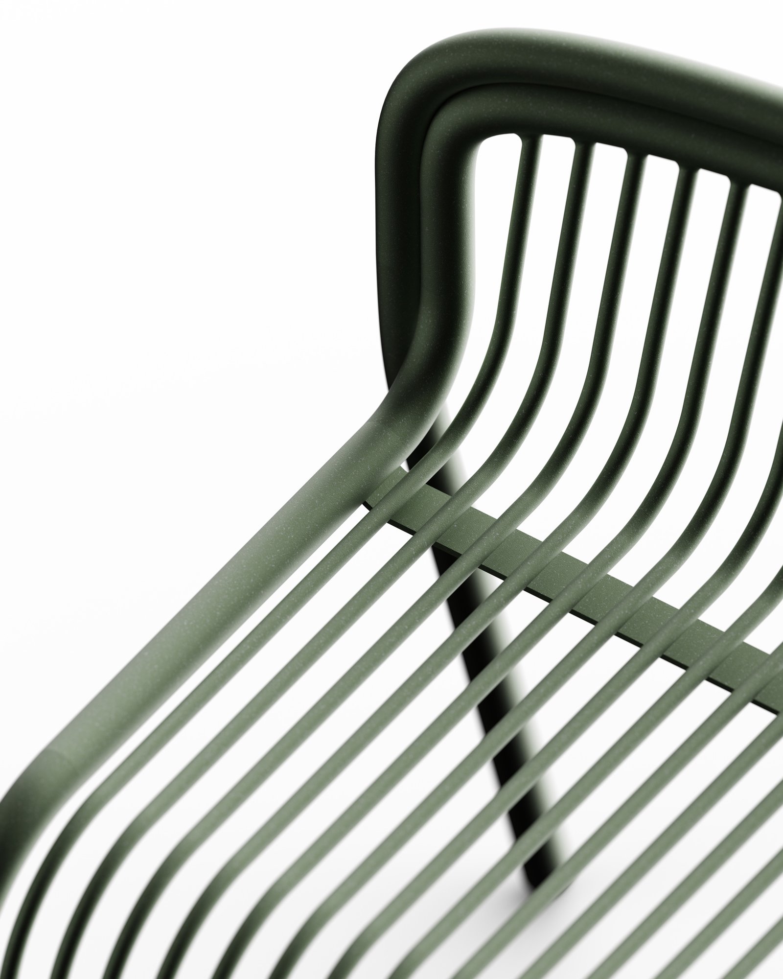 Détail du banc Plissée en acier thermolaqué vert — vue rapprochée sur la jonction entre le dossier et l'assise, révélant l'entrecroisement des fils d'acier et la précision des courbes de la structure tubulaire, design Alix Videlier.